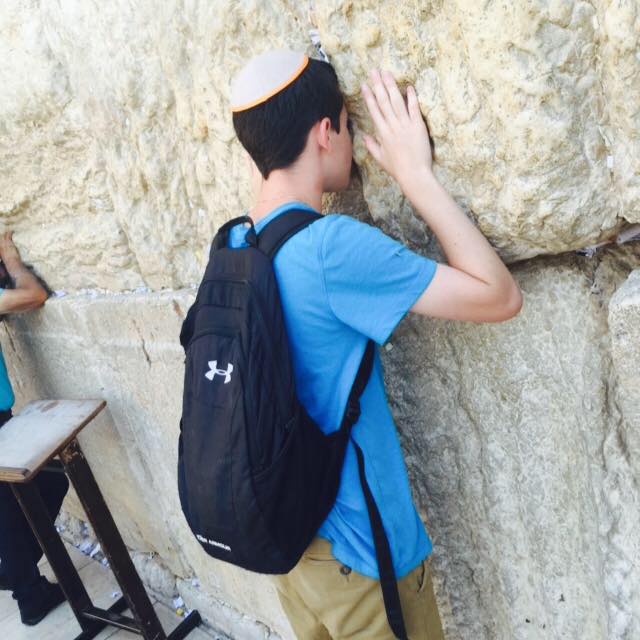 Sophomore+Justin+Marks+prays+by+the+Kotel.+He+recently+made+this+photograph+his+Facebook+profile+picture+to+show+his+support+for+Israel.