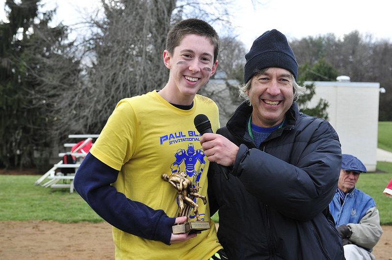 Jewish Text teacher Paul Blank poses with alumnus Dore Feith (14) at last years annual Paul Blank Invitational football game and fundraiser. 
