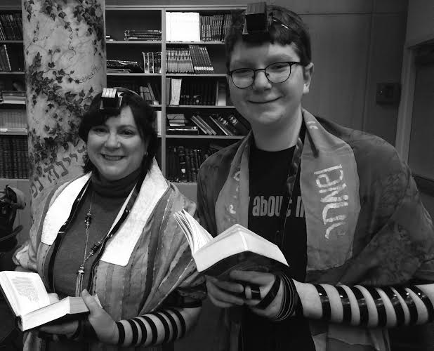 Senior Manny Bass and his mother, Jewish Text teacher Janet Ozur Bass, pray daily in the same Zman Kodesh.