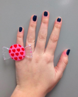 Junior Maya Arber prepares for Valentine’s Day by wearing her plastic candy ring. 
