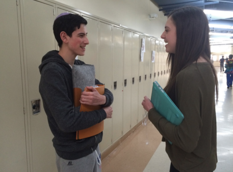 Freshmen Henry Sosland and Shira Finke discuss their recent English class.
