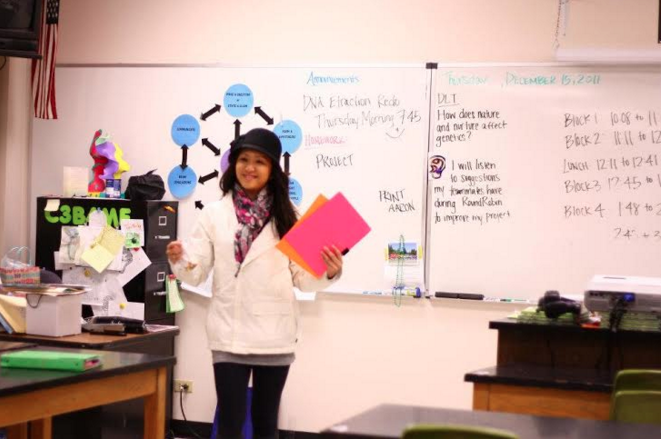 Science teacher Cassandra Ly poses in the front of a classroom in 2011. Since then, she has journeyed eastward from Colorado to become the newest addition to the Science department at CESJDS.
