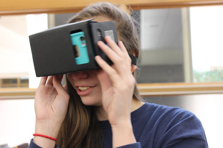 Freshman Shoshana Scott experiences a virtual video through Google Cardboard.