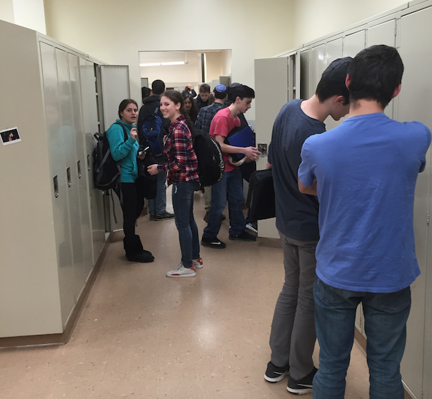 After moving in, sophomores interact at their new lockers in the alcove.