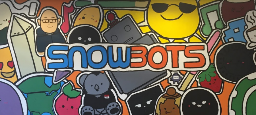 The mural at the entrance of Snowbots is adorned with robots, symbols of D.C. and other images.