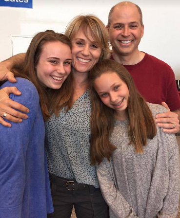Lindner with wife, Michelle, and children, Sophia (right)
and Jade (left), who are attending CESJDS this year.