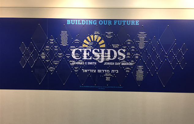 A plaque in the Upper School contains names of major CESJDS donors. 