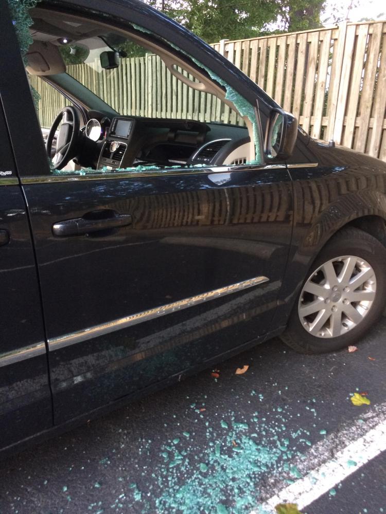 Yesterday evening, Lisa Stone parked her 2014 Chrysler Town and Country in the furthest right aisle of the parking lot. When she returned, the window was shattered and her wallet was missing.