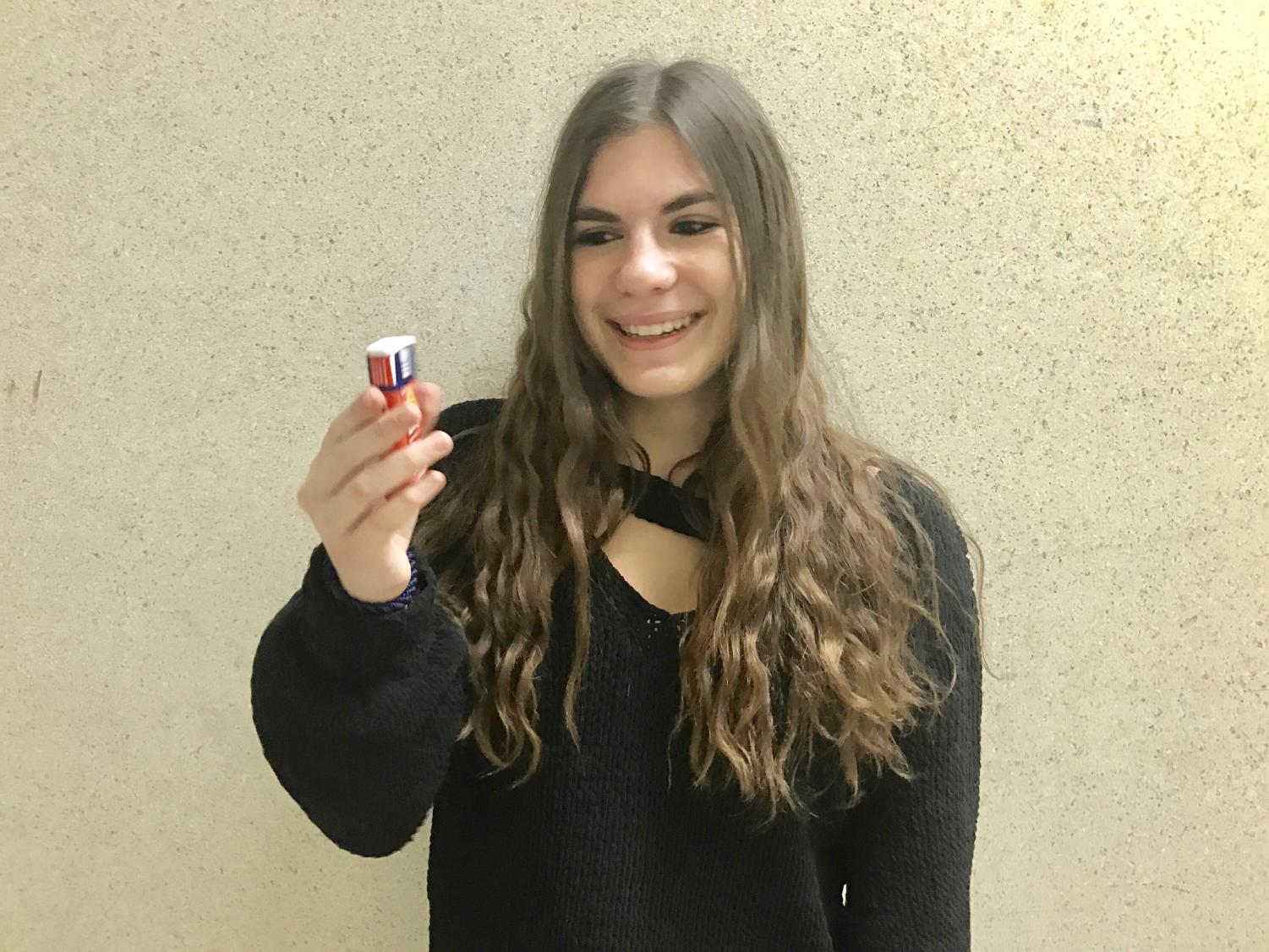 Freshman Sami Himmelfarb holds her Auvi-Q injector. Unlike an EpiPen, the Auvi-Q includes an automated voice to walk the individual through the lifesaving procedure.