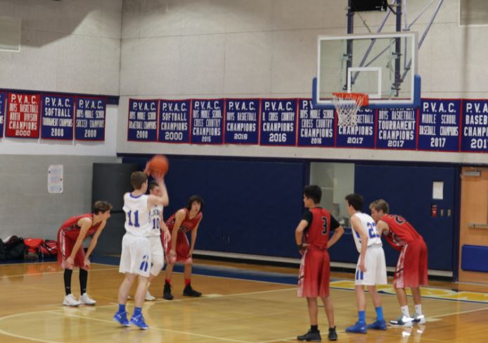 Sophomore captain  Zach Gross shoots a free throw against the Washing Waldorf Knights on Monday. Gross scored six out of the teams first ten shots in the first quarter. 