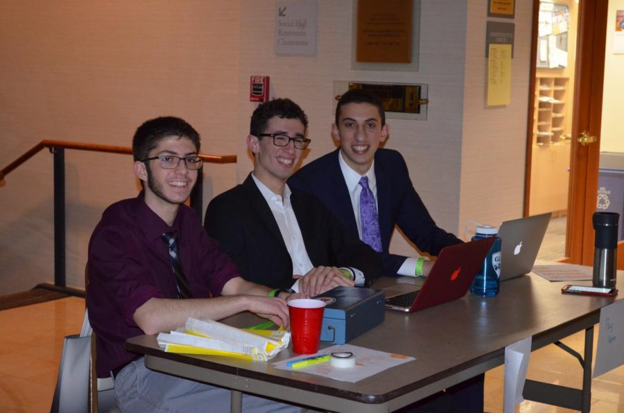 Junior class presidents Max Stravitz and Ari Gershengorn and junior Ilan Gasko collect payment at the dance. The junior grade government made $1500 from the dance.