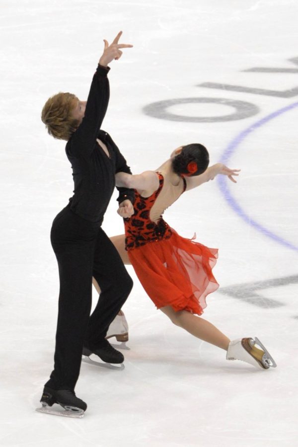 Junior Eliana Gropman skates with her partner in an ice-dancing competition. Gropman has been skating since she was four years old.