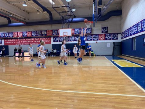 Lions varsity basketball teams face off against alumni