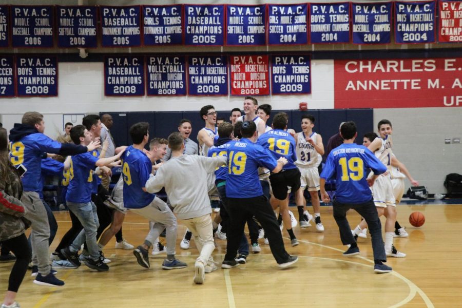 CESJDS students celebrate after a Lions win against rival school Berman Hebrew Academy.
