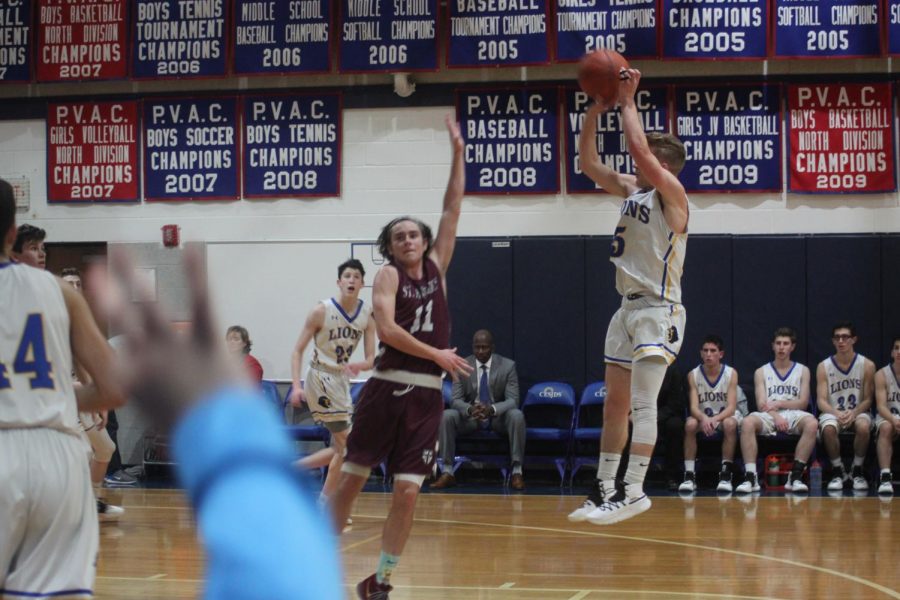 Senior Dani Offer takes a jump shot in the game versus St. Anslems Wednesday night.