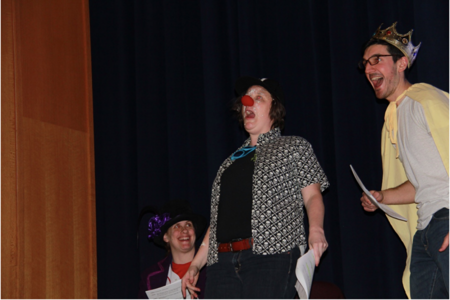 High school math teacher Tori Ball (center) organizes and plans the annual comedic Purim Spiel for the upper school each year.