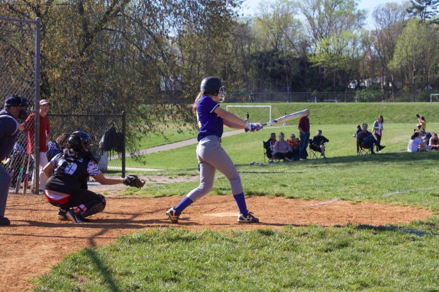 Sophomore and pitcher Sasha Trainor hits the ball in the girls varsity softball game vs. Mclean on Tuesday.