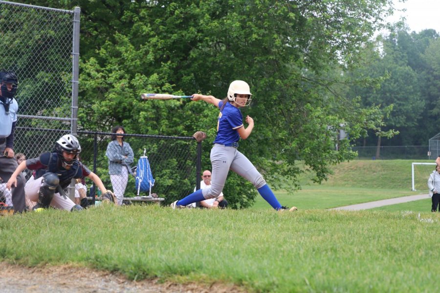 Sophomore and captain Jane Trainor swings and misses in the varsity softball semifinals against Burke.