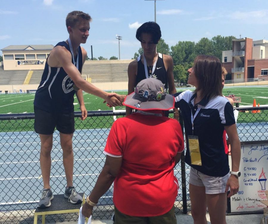 Josh Bachrach accepting one of the six medals he won at the Maccabi games in Atlanta this summer.
