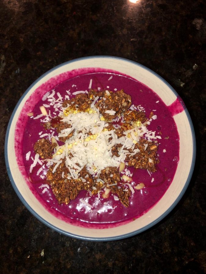 An acai bowl, a thick smoothy topped with fruits or other natural food items, is pictured above.