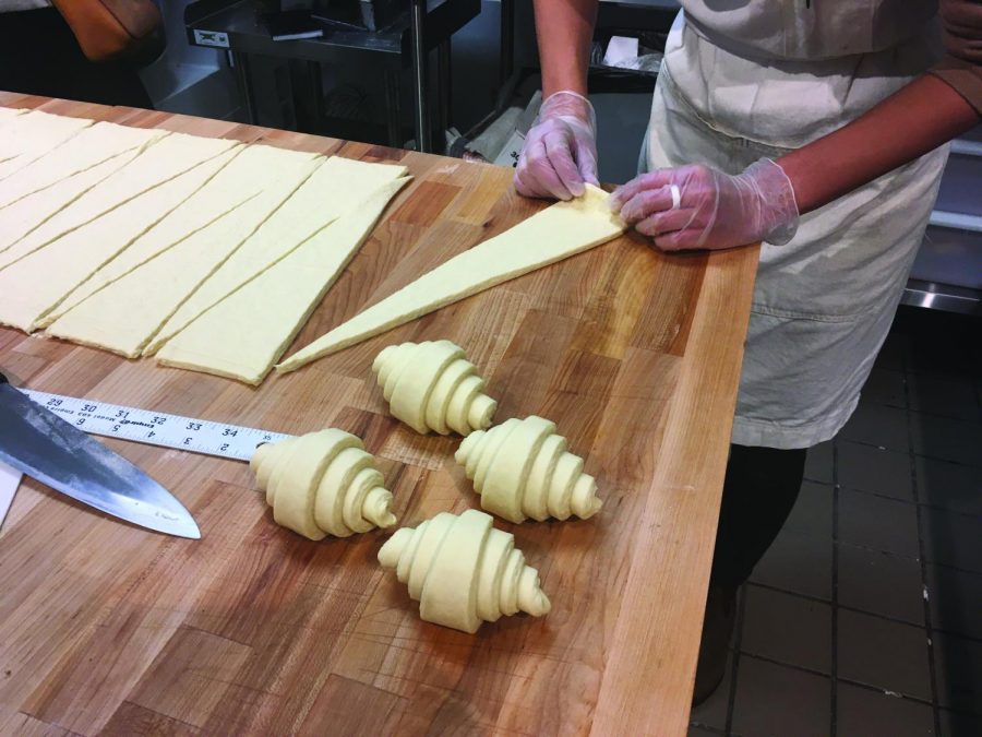 The owner of Sunday Morning Bakehouse, Caroline Yi, hand rolls croissants daily. 
