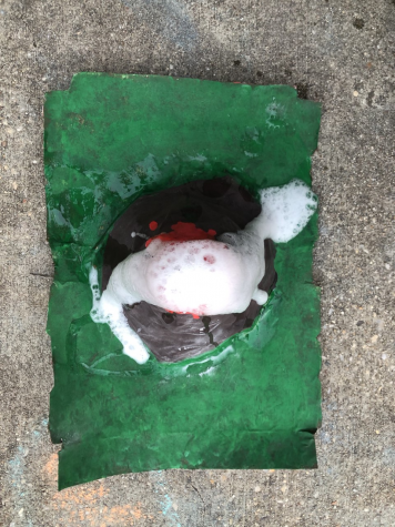 Matan Silverberg's baking soda volcano explodes. He made it with his siblings to pass the time while socially distancing at home. Doing creative activities with siblings is just one of many ways to occupy yourself during this period.