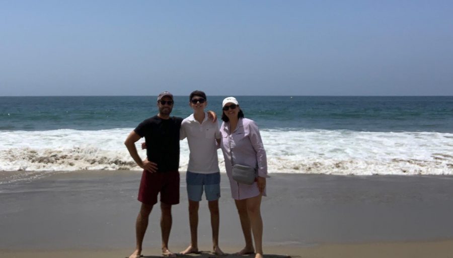 Lincoln Aftergood stands on the beach with his mother and cousin in California over the summer.