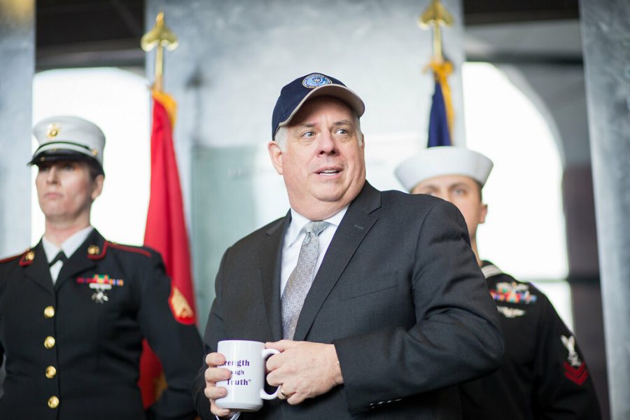 Governor Larry Hogan attends a ceremony at Fort Meade, before receiving a tour of the facility.