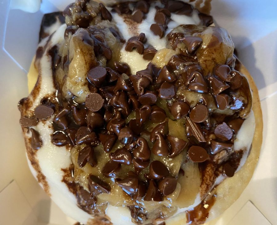 Nadaner+ordered+the+Cookie+Monster%2C+which+is+a+roll+topped+with+cream+cheese+frosting%2C+cookie+dough+and+chocolate+sauce.+