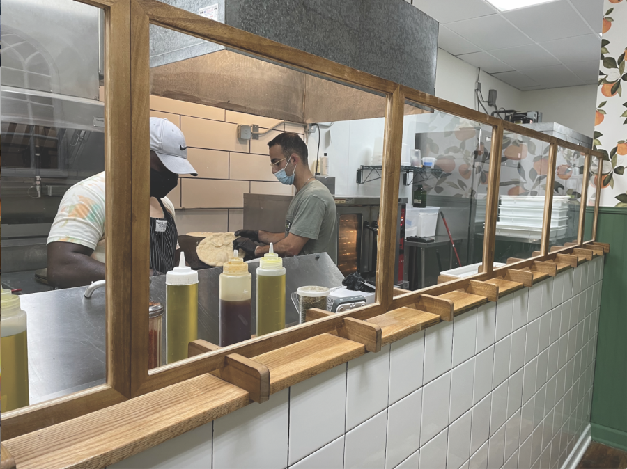 Behind the counter, fresh manoushe is prepared within 10 minutes of ordering.