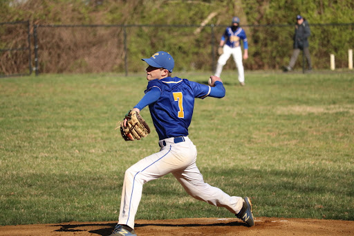 Junior Jonah Gross throws a pitch. 