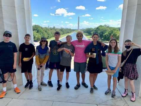 Eighth grade students pose for a picture at the Lincoln Memorial in Washington D.C. during a field trip. The students participated in a scavenger hunt on the national mall.