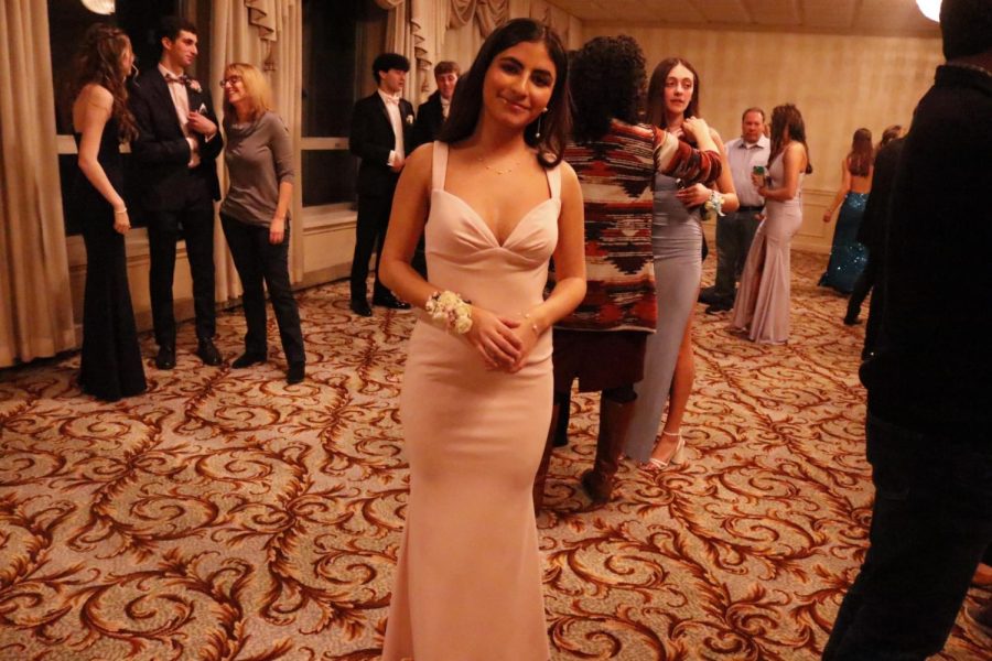 Senior Ella Elimelech excitedly entered JDS prom in her baby pink dress. When looking for her prom dress, senior Ella Elimelech had an idea of what she wanted, “I knew I wanted something simple and elegant,” Elimelech said. This isn’t what I originally had in mind but once I tried it on, I fell in love.” Elimelech landed on this gorgeous gown from Revolve. 
