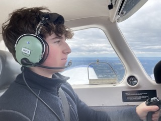 Yoav Amit takes to the skies with his instructors to learn his way around his plane.