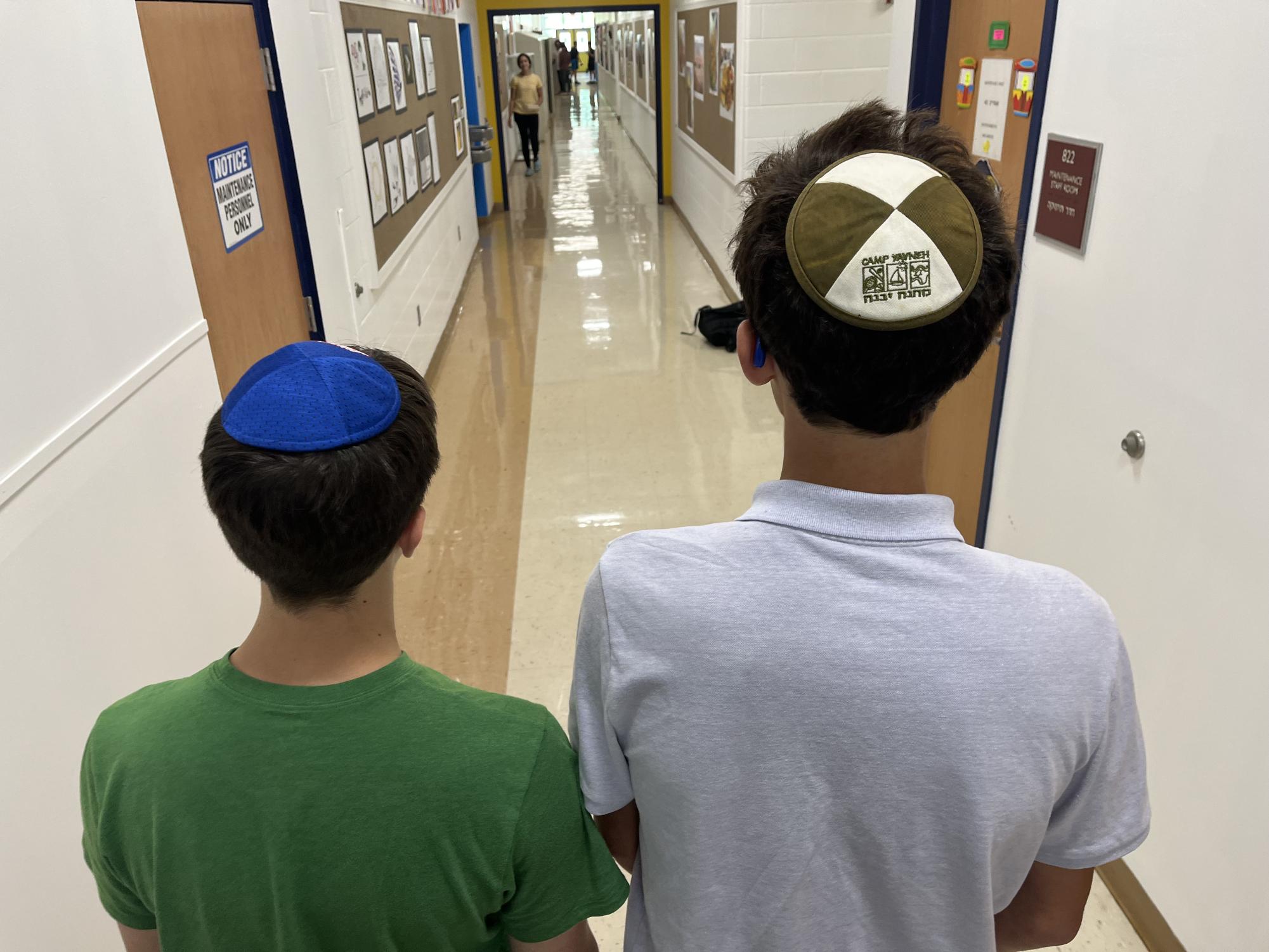 The school is enforcing the kippot policy for male-identifying students. 