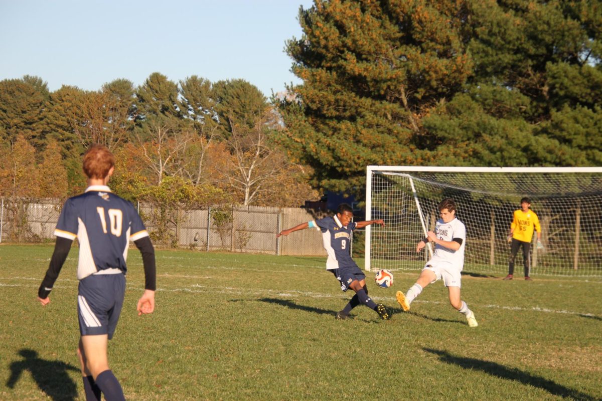 Sophomore Eitan Rattner deflects the ball away from the opposing team’s striker. While the Lions continued to struggle on offense, their defense remained stellar throughout the game.
