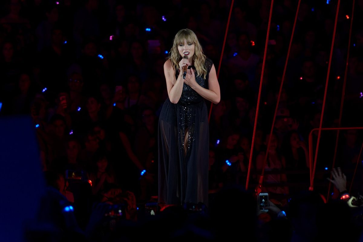 Taylor Swift performing on her Reputation tour in 2018, one of her many eras explored in the movie.

By Ronald Woan, CC BY-SA 2.0, https://commons.wikimedia.org/w/index.php?curid=131815897