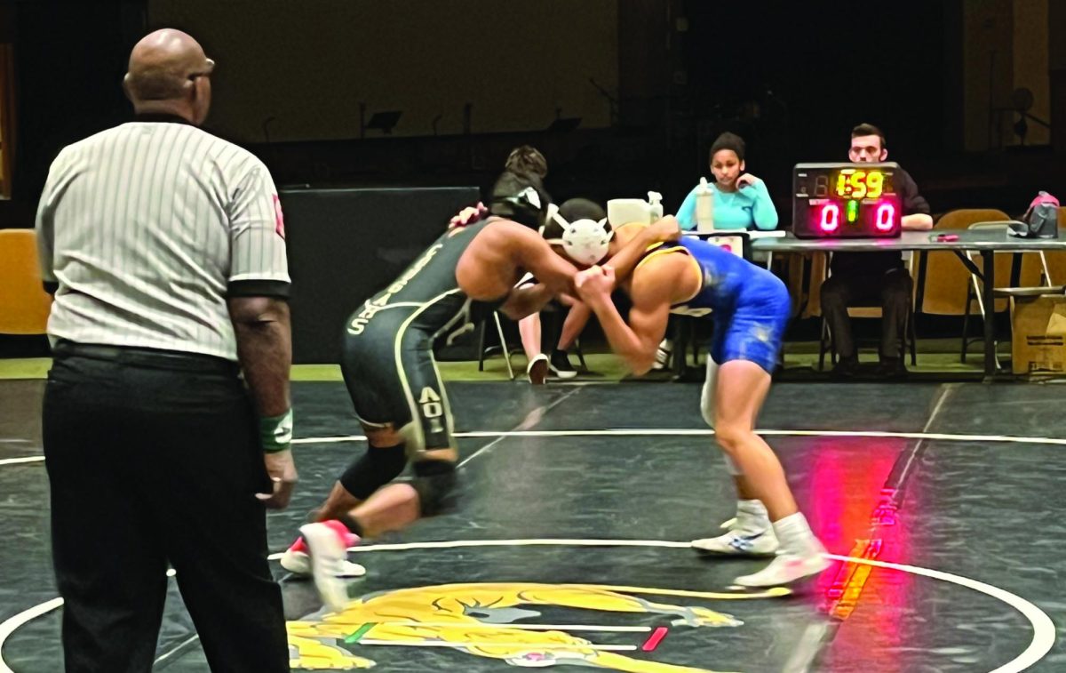 Freshman Zoya Wexler wrestles an opponent from Covenant Life. He won this match 16-0.