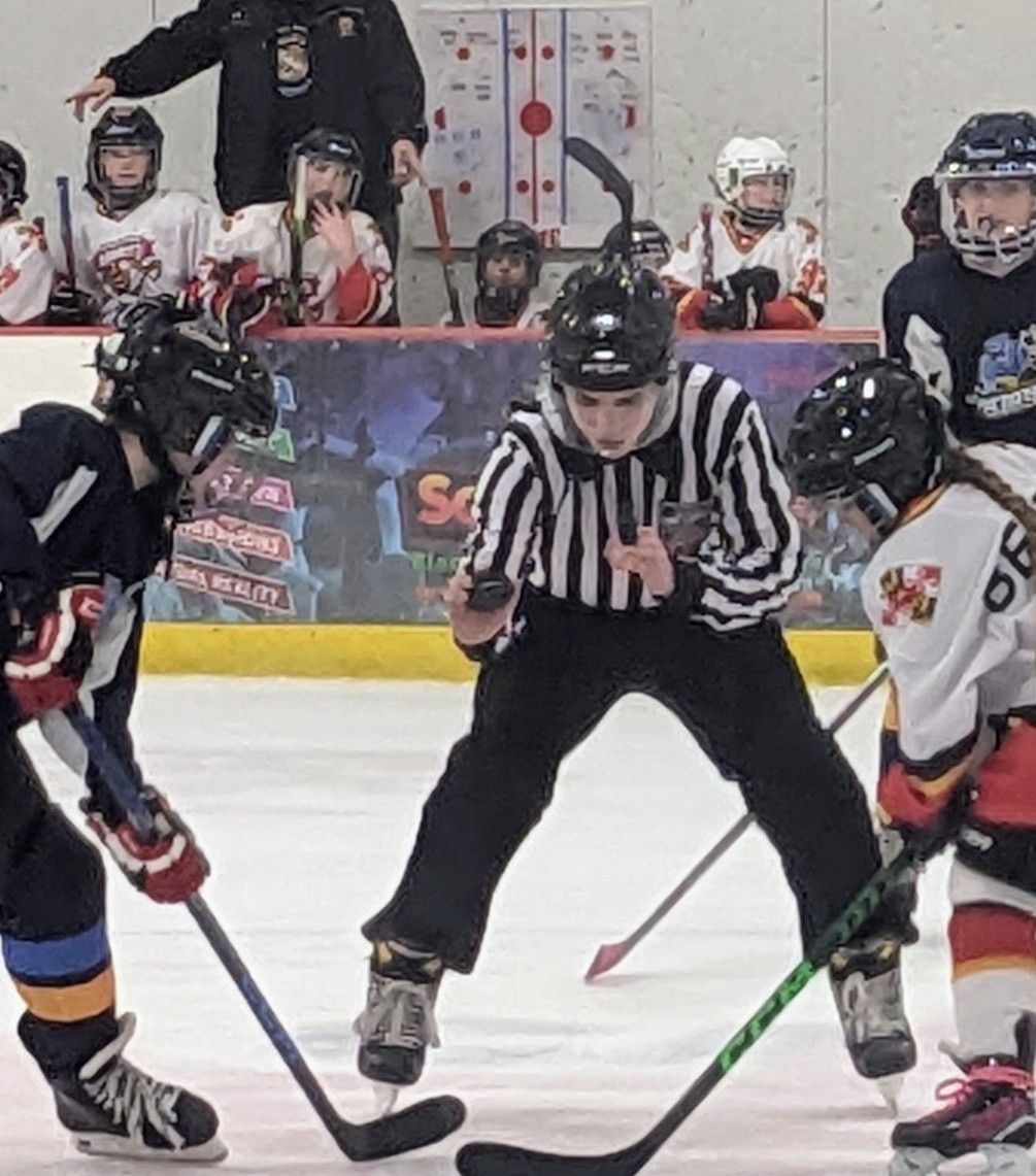 Sophomore Ari Solomon referees a 12U ice hockey game, and watches to make sure that all players are acting in accordance with the rules. 