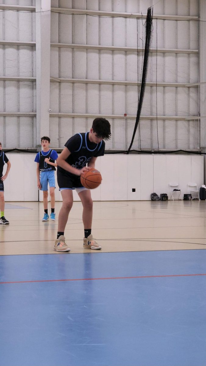 Freshman Shia Messler clears his head amidst a basketball game 