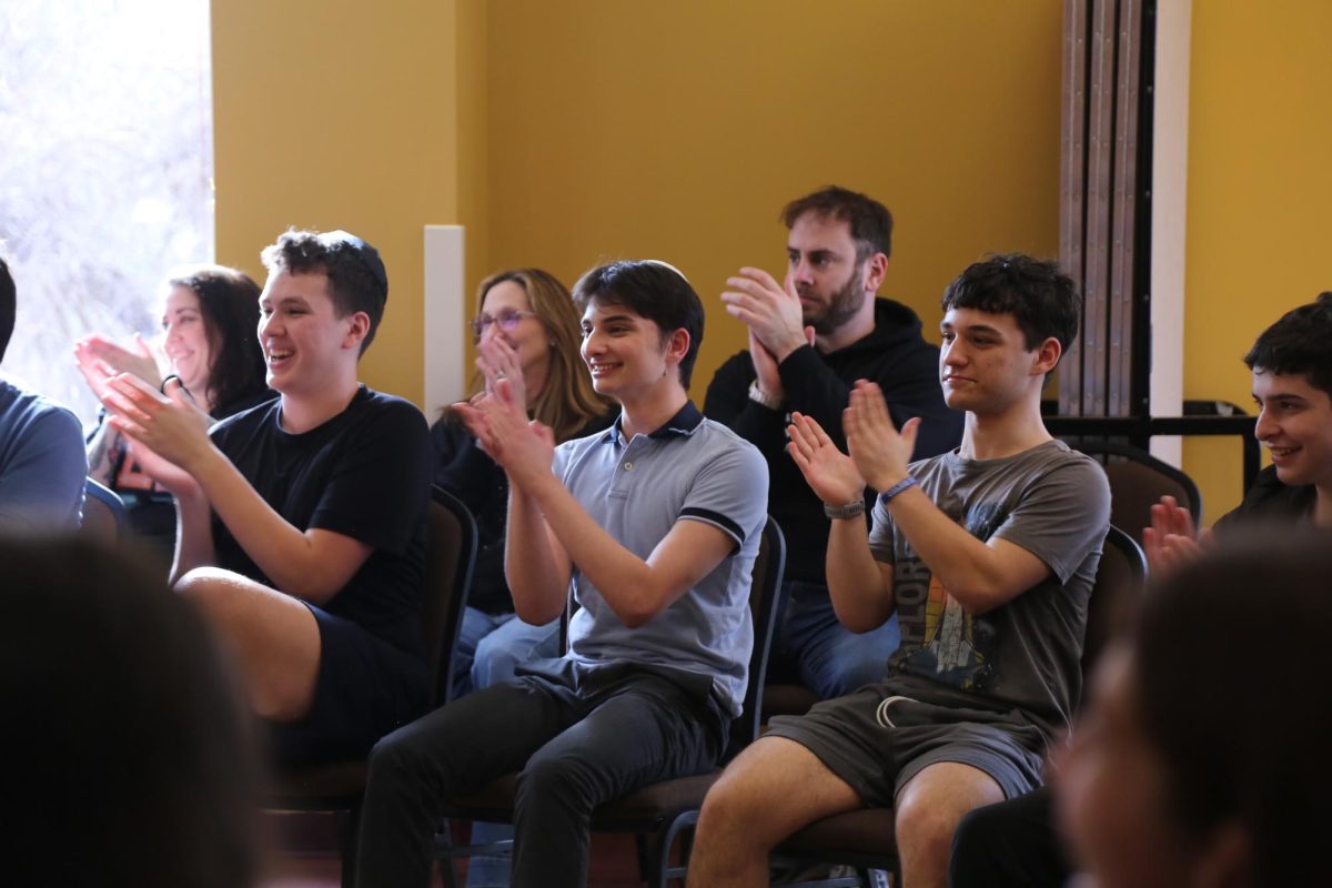 Students participate in grade-wide discussions at Pearlstone Retreat Center. Photo by Abby Chesman.