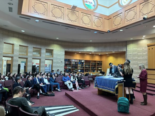 Students present bills to the floor before they are voted on. Photo by Eliana Abrams.