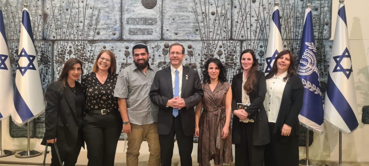 Arditi Zarouk (second from left) celebrates the 50-year anniversary of Perach with her team at the residence of Israeli President Herzog. Used with permission from Arditi Zarouk.