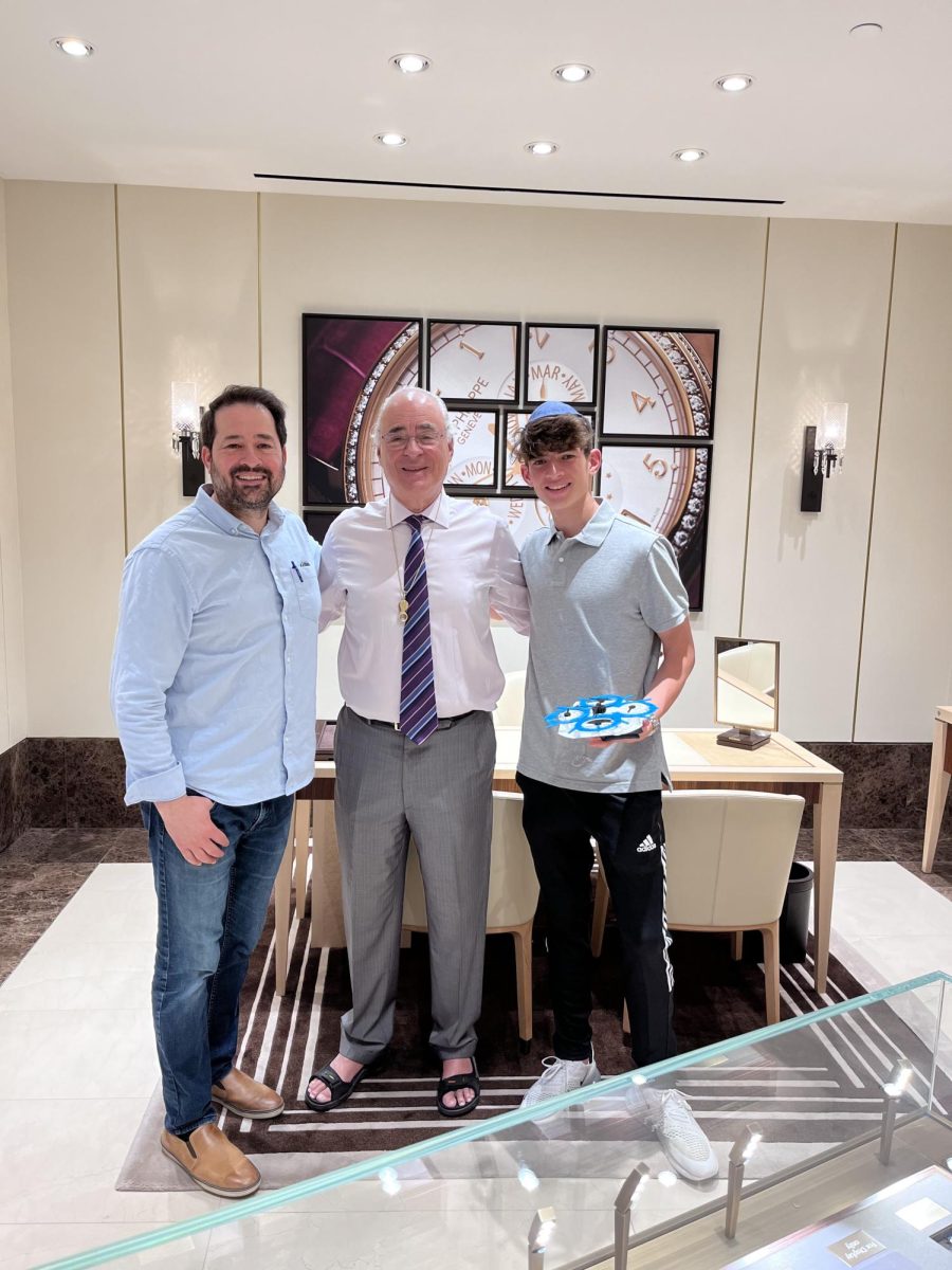 Milner-Gillers and his dad met with a watch store owner who was interested in one of Milner-Gillers watch designs. Used with permission from Milner-Gillers.