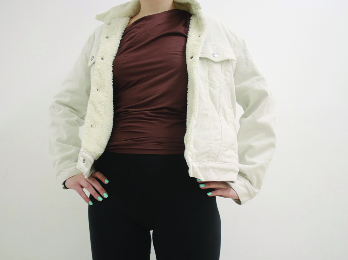 The napkin top paired with a jacket makes a great outfit for any social event.
