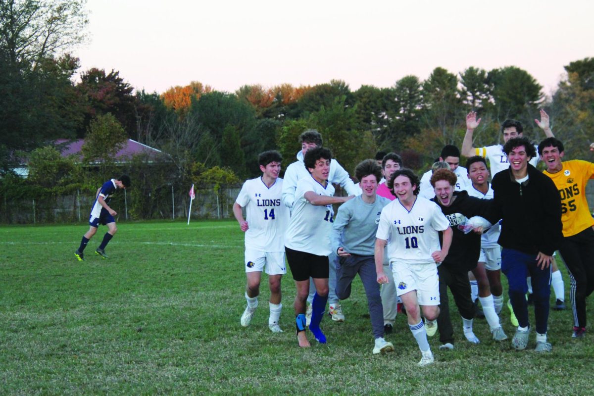 Junior Dylan Kobrin (middle, number 10) during the 2023 soccer season after scoring the winning goal in the quarterfinal game.