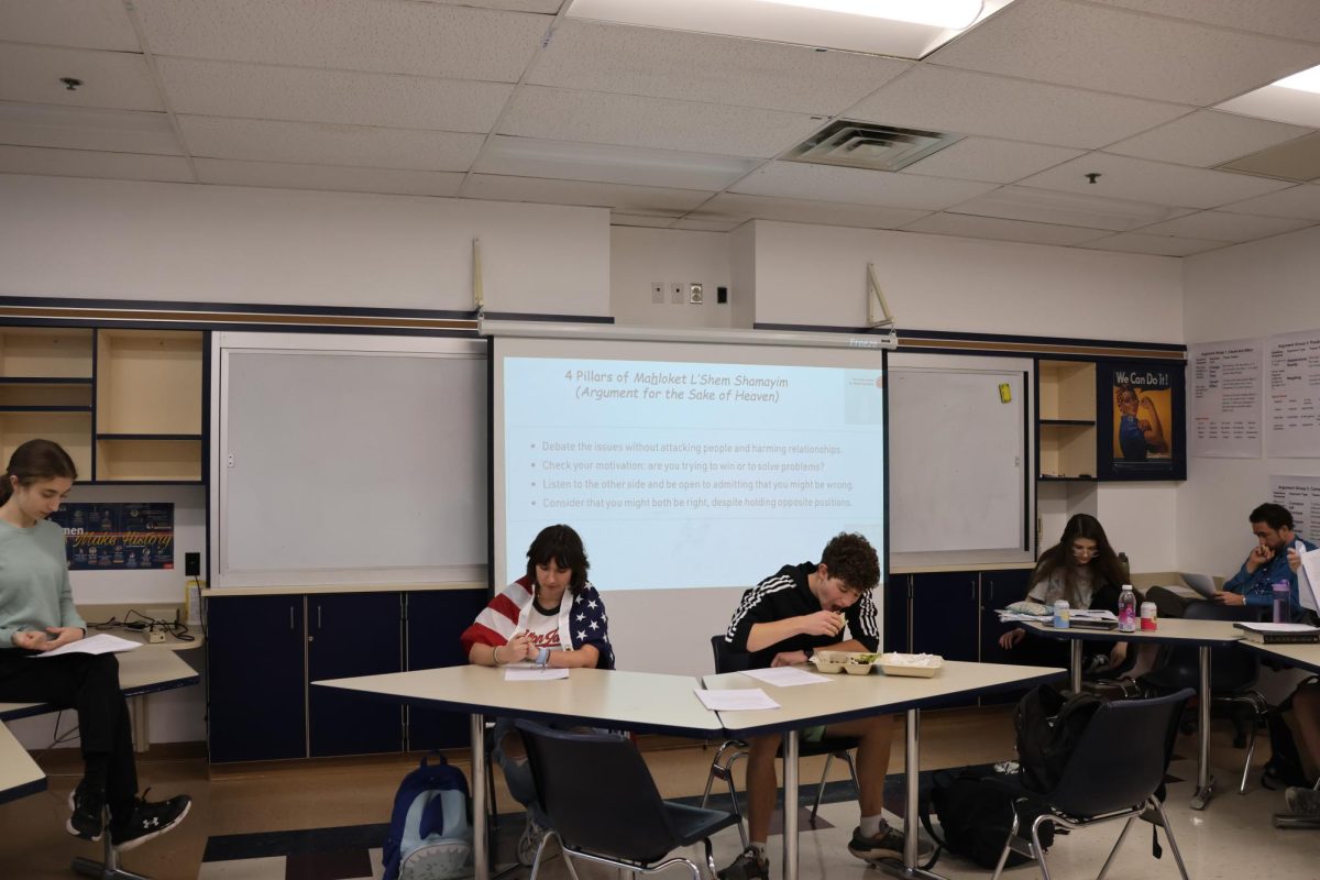 Seniors lead a conversation about voting reform during lunch on Oct. 28. Photo by Vivi Ducker, LT