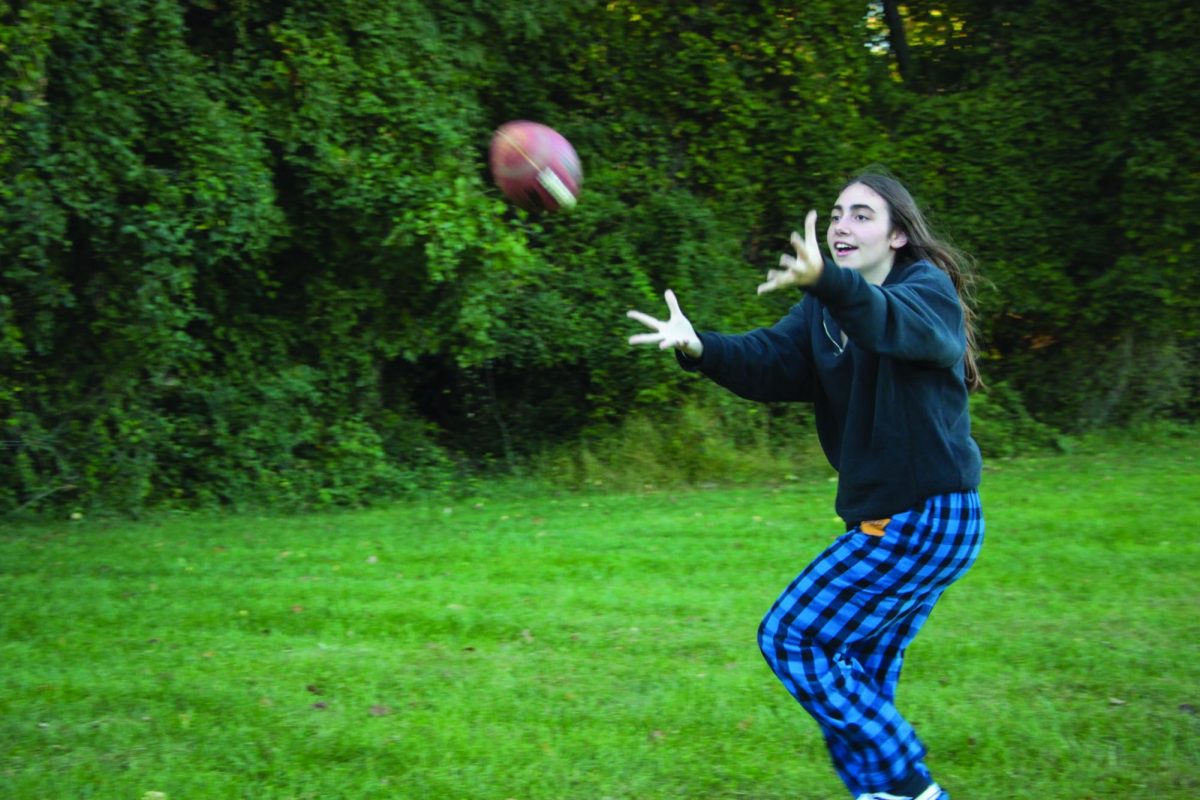 Junior Nolyn Ziman participates in the flag football club with her friends.
Ziman loves watching the sport and has appreciated the chance to play it
as well. 