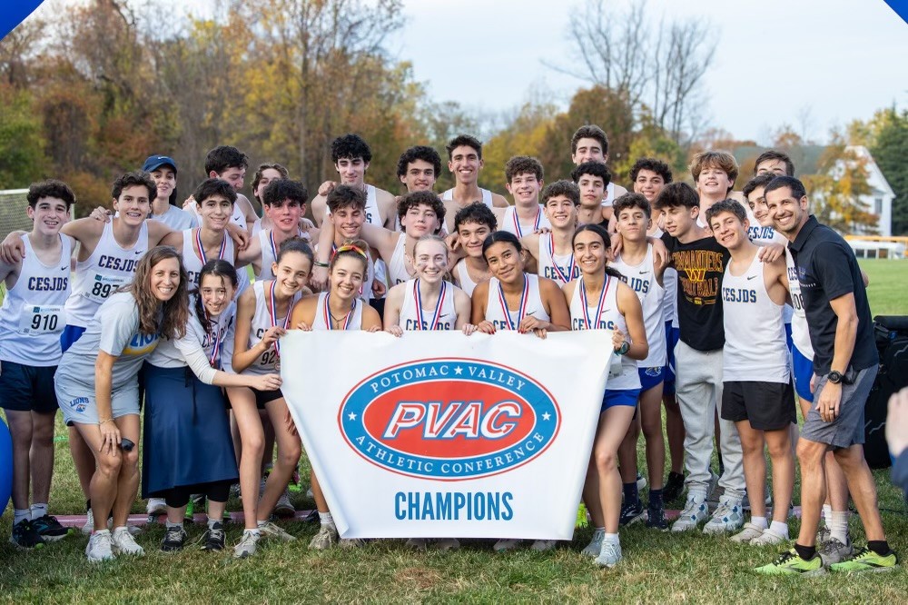 Oct. 29 marked the third time that both the varsity boys and girls cross country team have won a championship. Photo used with permission of Jason Belinkie.