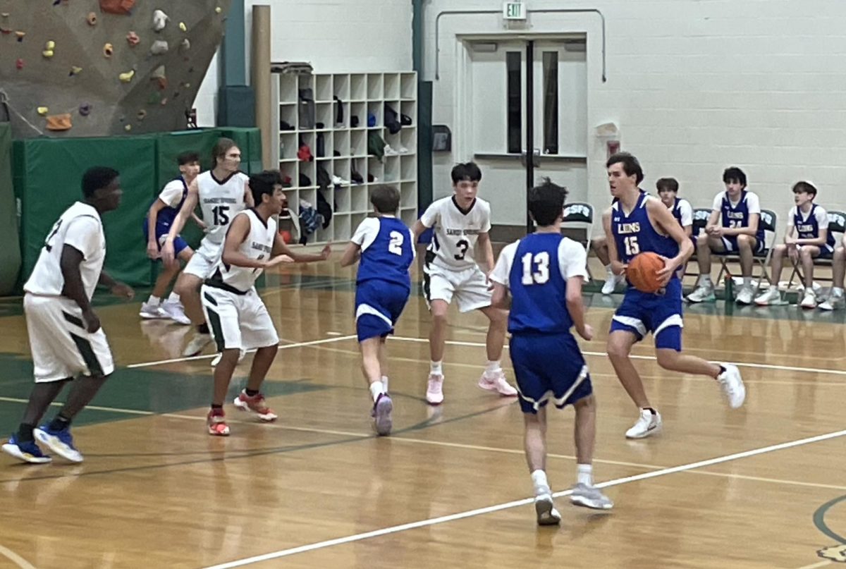 Sophomore Caleb Berman passes the ball in a game against the Wildebeests.